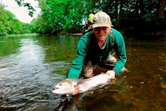 A 15lb salmon caught when fishing for trout in June 2014